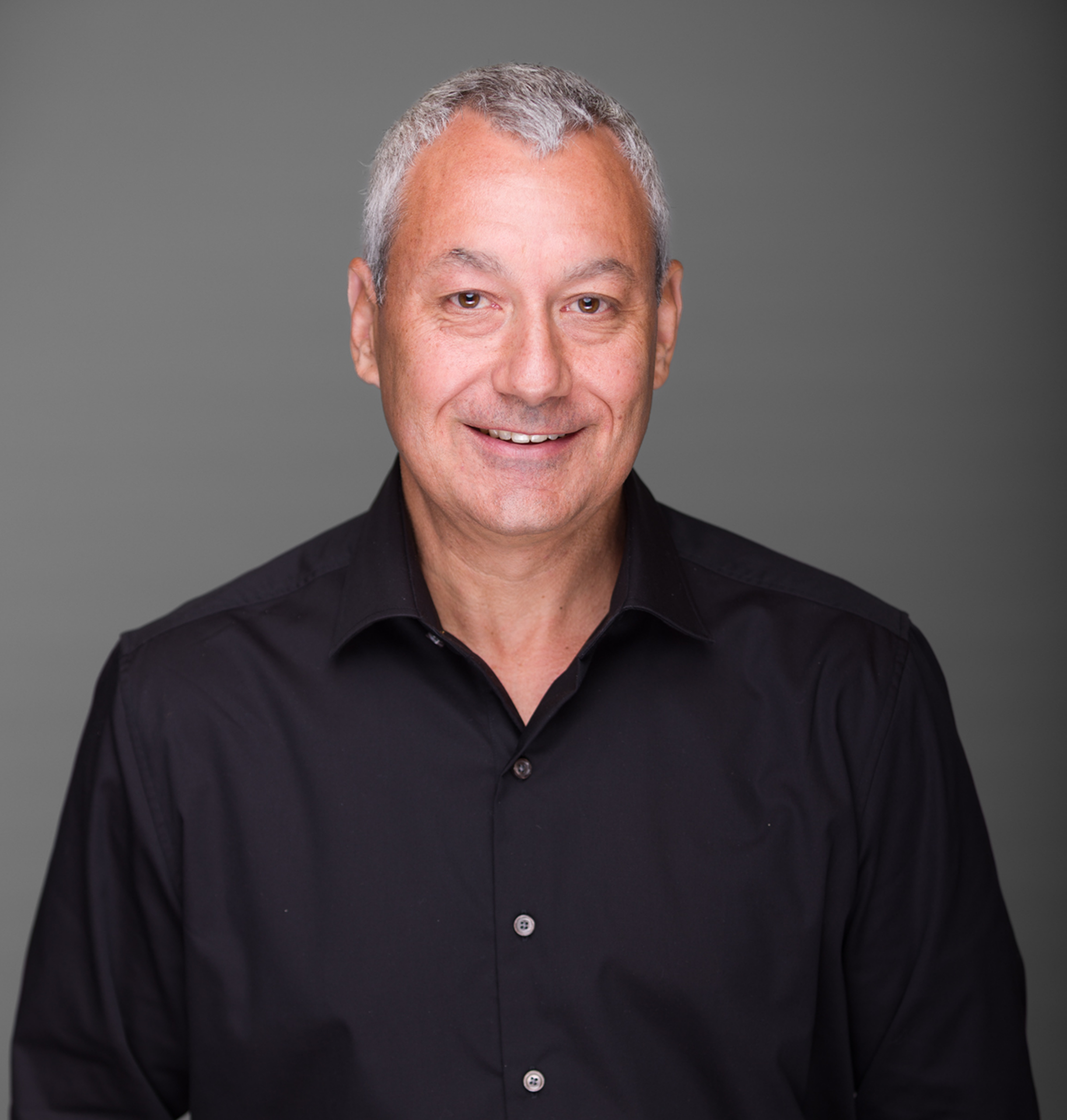 Portrait of Adam Gerber, newly appointed Head of Strategy at AdsLoom.net, specializing in GTM for the U.S. market